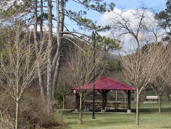 Gazebo in park against sky