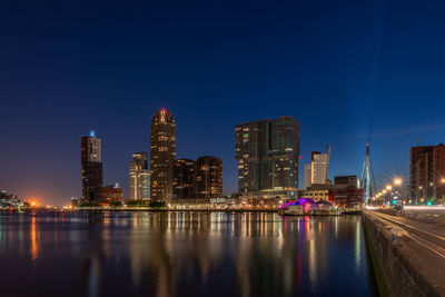 Illuminated buildings in city at night