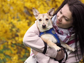 Portrait of woman with dog