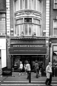 Man standing in front of building