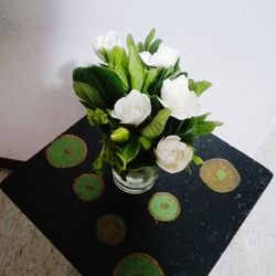 Close-up high angle view of flowers on table