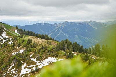 Scenic view of snowcapped mountains against sky