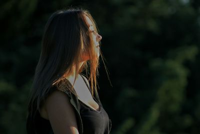 Thoughtful beautiful woman looking away