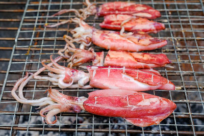 Close-up of meat on barbecue grill