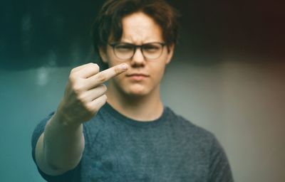 Portrait of man smoking cigarette