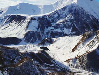 Scenic view of snowcapped mountains during winter