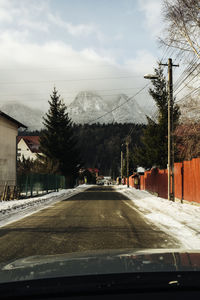 Road seen through car windshield