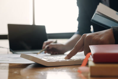 Man using laptop on table