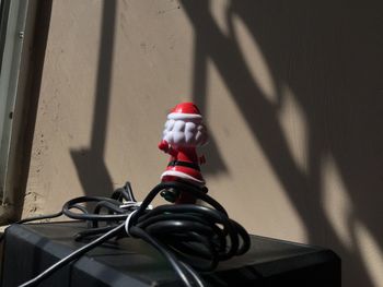 High angle view of electric lamp on wall