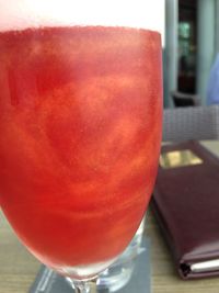 Close-up of red wine on table