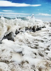 Scenic view of beach against sky