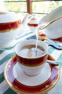 Close-up of coffee cup on table