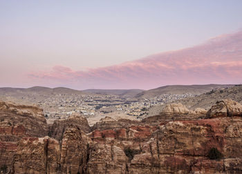 Scenic view of mountains against sky during sunset