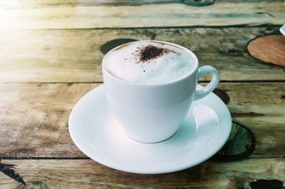 Close-up of coffee cup on table