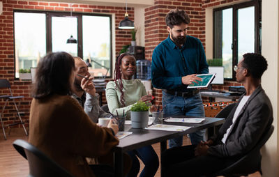 Business colleagues working at office