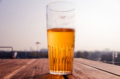 Close-up of beer in glass on table