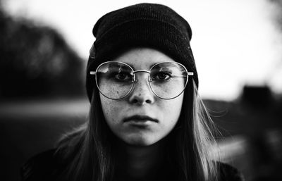 Portrait of young woman wearing knit hat