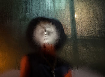 Close-up of man against blurred background