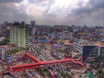 High angle view of buildings in city against sky