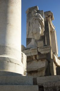 Low angle view of statue against sky