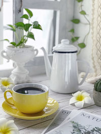 Close-up of coffee served on table