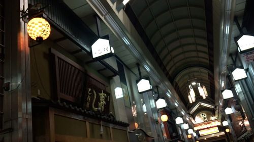 Low angle view of illuminated ceiling