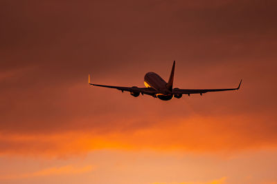 737 aeroplane take off - sunset