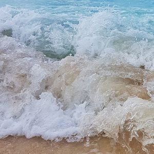 High angle view of waves on beach