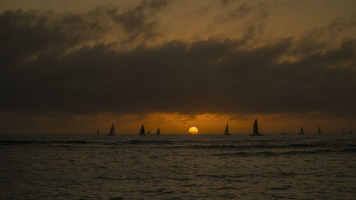 Scenic view of sea against sky during sunset