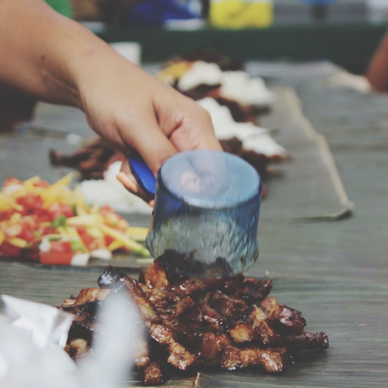 food and drink, person, food, freshness, holding, healthy eating, part of, cropped, unrecognizable person, lifestyles, human finger, focus on foreground, ready-to-eat, close-up, indoors, indulgence, preparation