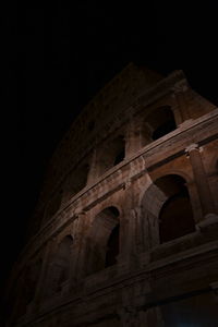 Low angle view of historical building against sky at night