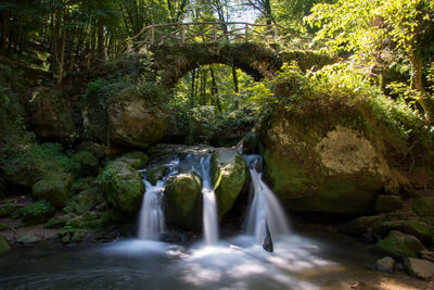 Stream flowing through rocks