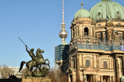 Low angle view of historic building against clear sky