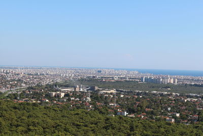View of cityscape against clear sky