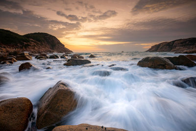 Scenic view of sea against sky during sunset