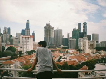 Woman looking at city skyline