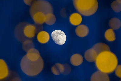 Defocused image of moon at night