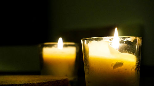 Close-up of lit tea light candles