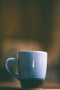 Close-up of coffee cup on table