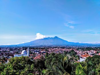 View of city against blue sky