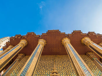 Low angle view of building against blue sky