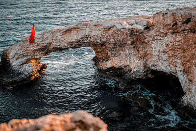 High angle view of rock formation in sea. love bridge in ayia napa. 