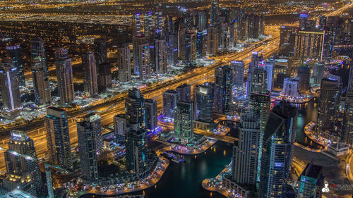 High angle view of illuminated buildings at night