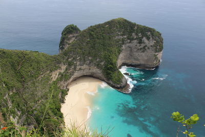 High angle view of rocks on sea