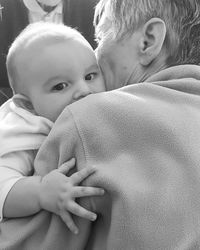 Close-up of cute baby holding hands