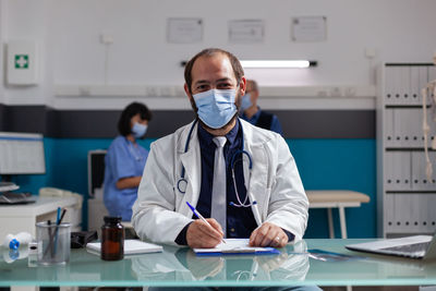 Female doctor working in laboratory