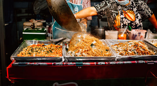 Variety of food for sale at market stall