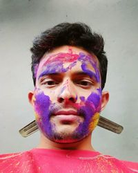 Close-up portrait of a man wearing mask