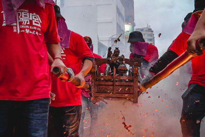 People working on street in city