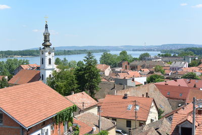 Buildings in town against sky